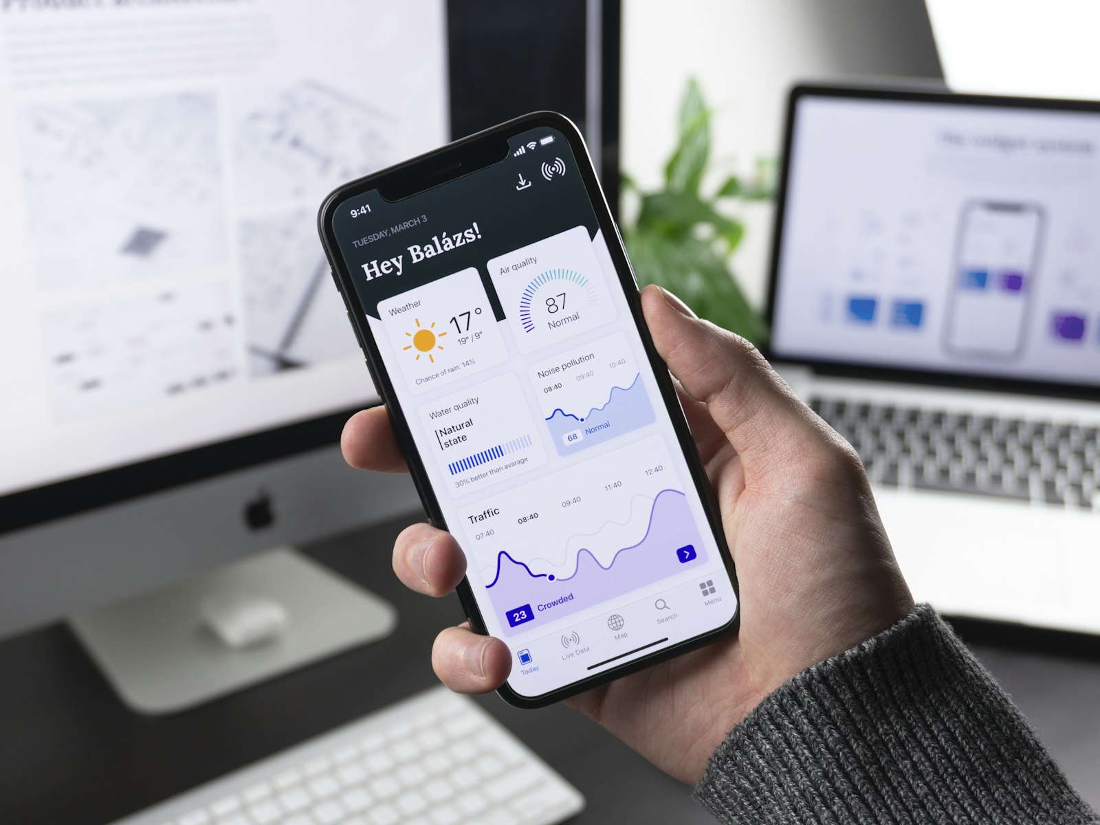 App screens on a desk